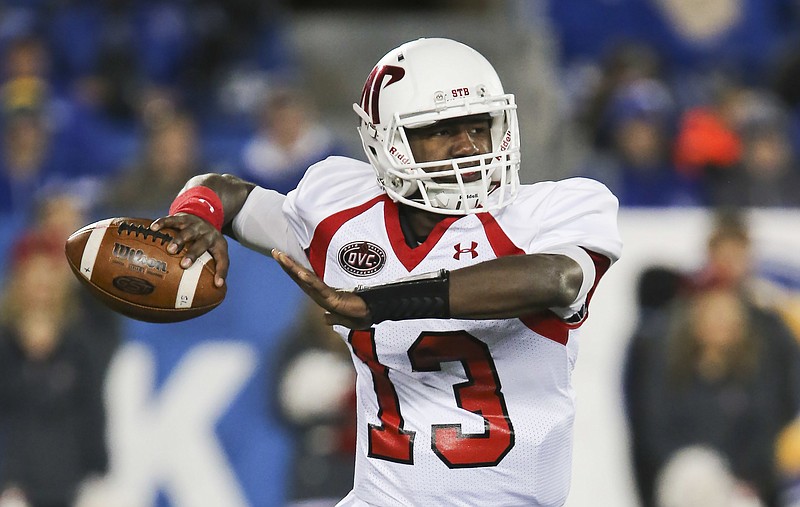 Austin Peay quarterback JaVaughn Craig throws to a receiver downfield in the first half of an NCAA college football game against Kentucky Saturday, Nov. 19, 2016, in Lexington, Ky. (AP Photo/David Stephenson)