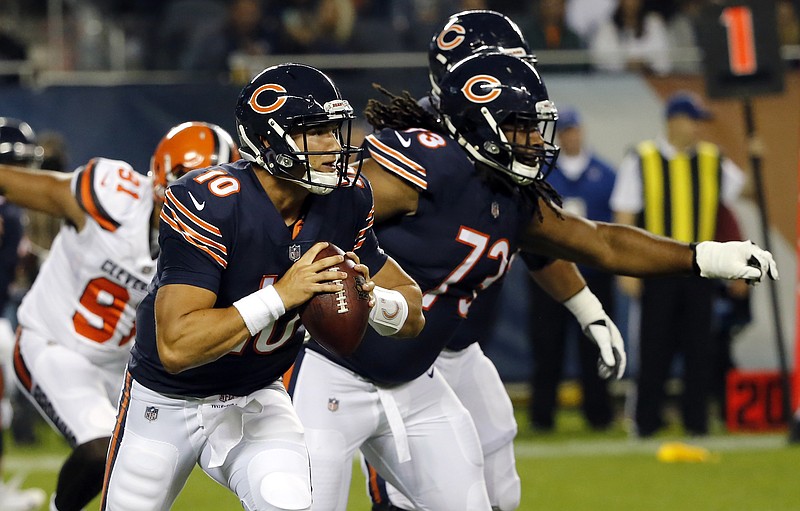 
              FILE- In this Aug. 31, 2017, file photo, Chicago Bears quarterback Mitchell Trubisky (10) scrambles during the first half of an NFL football game against the Cleveland Browns in Chicago. Trubisky, the No. 2 overall draft pick from North Carolina, will start against the Minnesota Vikings next Monday night, after Mike Glennon struggled in the first four games, a person familiar with the situation said Monday, Oct 2, 2017. The person spoke on the condition of anonymity because the team has not announced the move. (AP Photo/Charles Rex Arbogast, File)
            