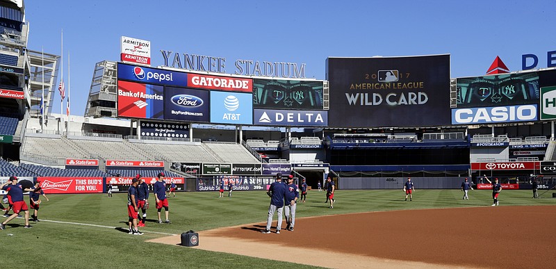 
              The Minnesota Twins workout at Yankees Stadium, Monday, Oct. 2, 2017, in New York. The Twins face the New York Yankees in the American League wild card playoff game on Tuesday. (AP Photo/Frank Franklin II)
            