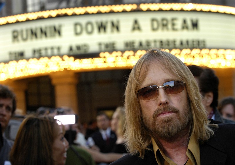 
              FILE - In this Oct. 2, 2007 file photo, singer Tom Petty arrives at the world premiere of the documentary "Runnin' Down a Dream: Tom Petty and the Heartbreakers" in Burbank, Calif. Petty has died at age 66. Spokeswoman Carla Sacks says Petty died Monday night, Oct. 2, 2017, at UCLA Medical Center in Los Angeles after he suffered cardiac arrest. (AP Photo/Chris Pizzello, File)
            