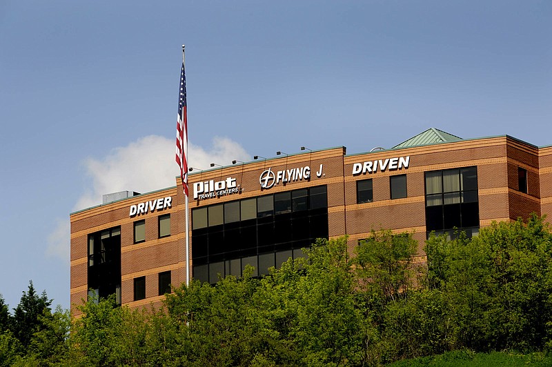 This April 30, 2013, file photo shows the Pilot Flying J corporate offices in Knoxville, Tenn. Warren Buffett's Berkshire Hathaway is acquiring a major stake in Pilot Flying J truck stops and it will become a majority owner within about five years, in a deal announced Tuesday, Oct. 3, 2017. (Michael Patrick/Knoxville News Sentinel via AP, File)