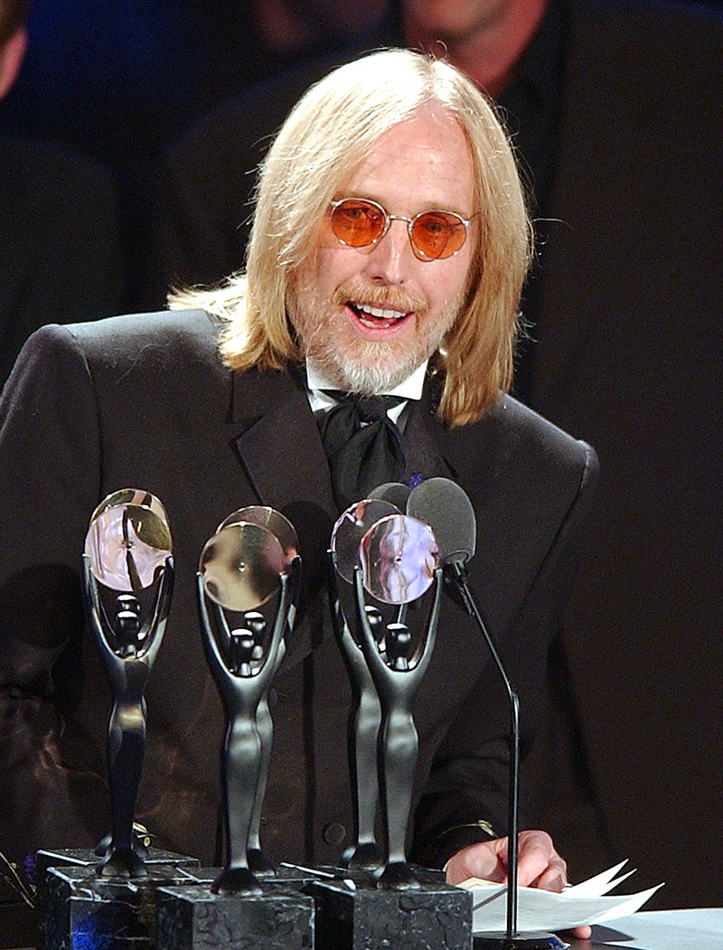 
              FILE - In this March 18, 2002 file photo, Tom Petty, of the band Tom Petty and the Heart Breakers, speaks after being inducted at the Rock and Roll Hall of Fame induction ceremony in New York. Petty has died at age 66. Spokeswoman Carla Sacks says Petty died Monday night, Oct. 2, 2017, at UCLA Medical Center in Los Angeles after he suffered cardiac arrest. (AP Photo/Kathy Willens, File)
            