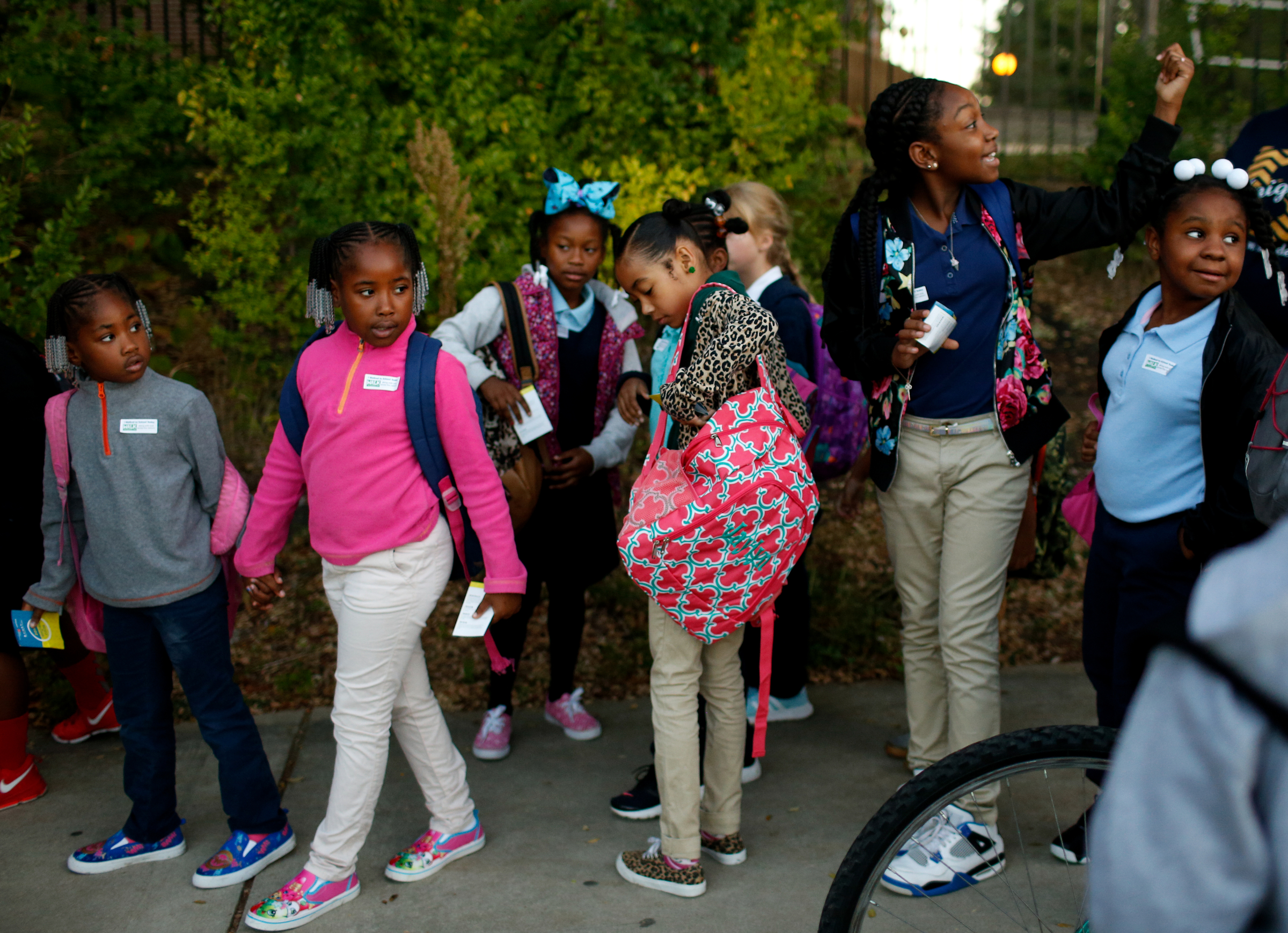 Brown Elementary students walk on the University Greenway from the University of Tennessee at Chattanooga's Challenger Center to school on East Eighth Street for International Walk to School Day on Tuesday, October 3, 2017, in Chattanooga, Tenn. Ten area schools have organized walk to school events this week in partnership with the Chattanooga-Hamilton County and North Georgia Transportation Planning Organizations.
