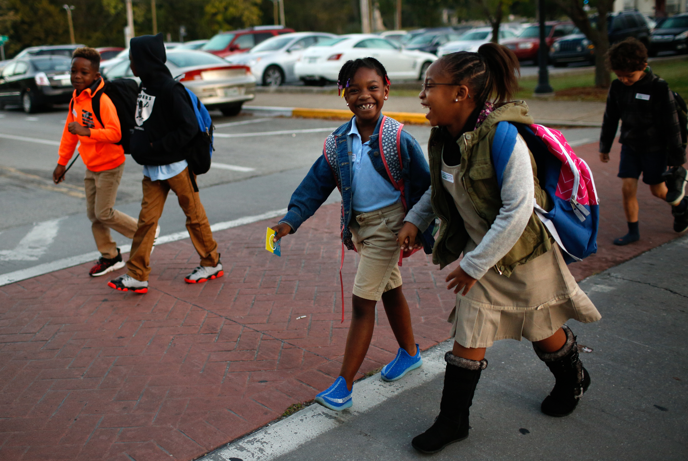 Brown Elementary students cross East Fifth Street as they walk from the University of Tennessee at Chattanooga's Challenger Center to school on East Eighth Street for International Walk to School Day on Tuesday, October 3, 2017, in Chattanooga, Tenn. Ten area schools have organized walk to school events this week in partnership with the Chattanooga-Hamilton County and North Georgia Transportation Planning Organizations.
