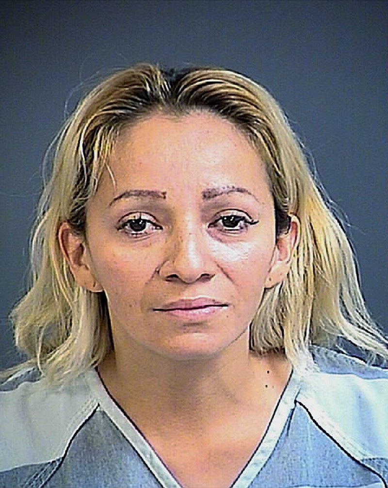 
              This photo provided by the Charleston County Detention Center shows Katty Andrea Carpio-Rios. Carpio-Rios and a man arrested Thursday, Sept. 28, 2017, in South Carolina with $35,000 and eight devices placed on gas pumps to steal credit card numbers may have stolen financial information from people all along Interstate 95 on the East Coast, authorities said. (Charleston County Detention Center via AP)
            