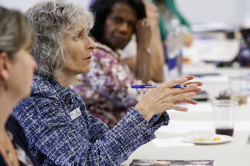 Beckie Retzer with the Southern Adventist University School of Nursing asks a question during a presentation to area nonprofits by Welcome Home held at Ray Evans Transit Center on Thursday, Sept. 14, 2017, in Chattanooga, Tenn. Welcome Home houses the terminally ill homeless to provide them with safe end-of-life care.