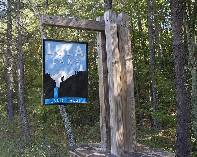 A sign for Lula Lake Land Trust is seen on Lula Lake Road across from the new Chattanooga Connector Trail and Moonshine Trails Oct. 6, 2017.