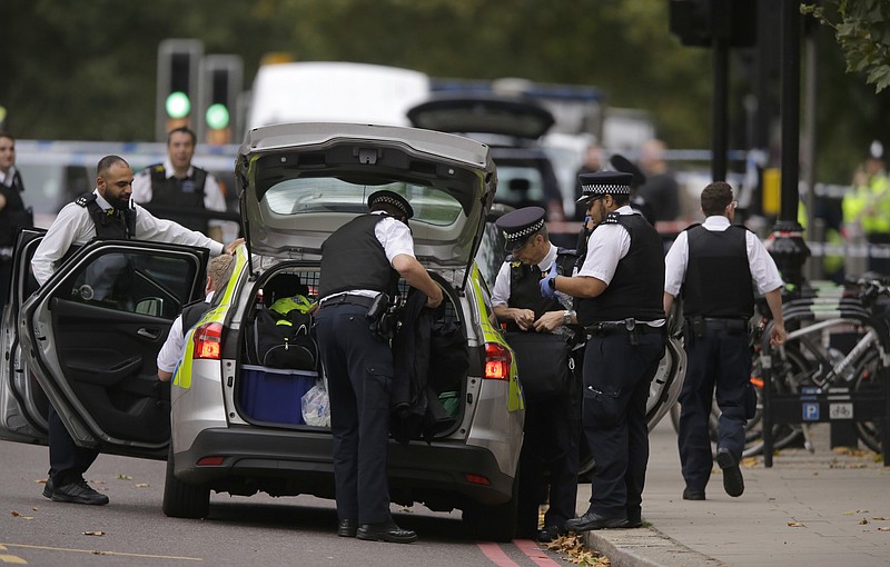 
              Britain's Police at the scene of an incident in central London, Saturday, Oct. 7, 2017. London police say emergency services are outside the Natural History Museum in London after a car struck pedestrians. (AP Photo/Alastair Grant)
            