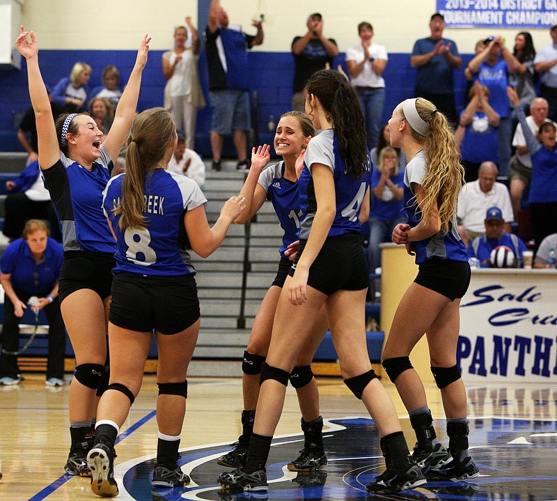 Sale Creek's volleyball team celebrates a win Monday, Oct. 9, 2017, after the Region 3-A high school volleyball tournament championship game against Columbia Academy at Sale Creek Middle High School in Sale Creek, Tenn. 