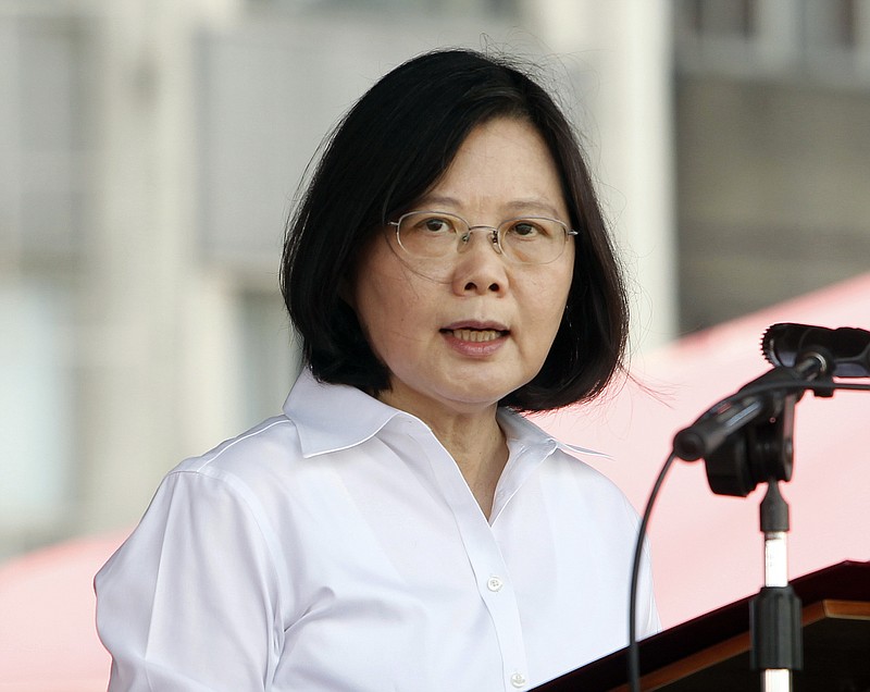 
              FILE - In this June 10, 2017 file photo, Taiwan's President Tsai Ing-wen delivers a speech during an offshore anti-terrorism drill outside the Keelung harbor in New Taipei City, Taiwan. Tsai said her island’s government will protect regional peace and stability amid heightened tensions with rival China, in an annual National Day address Tuesday, Oct. 10, 2017. (AP Photo/Chiang Ying-ying, File)
            