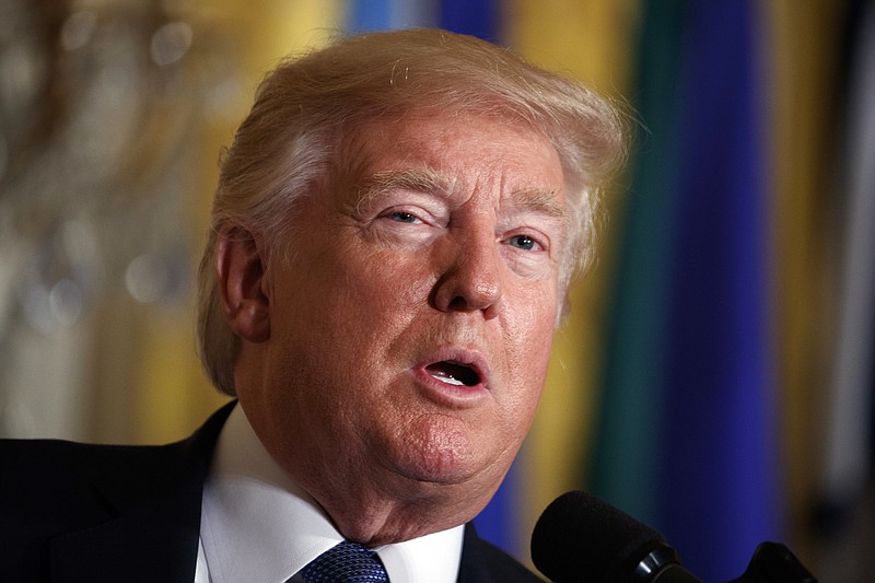 
              FILE - In this Friday, Oct. 6, 2017, file photo, President Donald Trump speaks during a Hispanic Heritage Month event in the East Room of the White House, in Washington. The White House is finalizing an executive order that would expand health plans offered by associations to allow individuals to pool together and buy insurance outside their states, a unilateral move that follows failed efforts by Congress to overhaul the health care system. A senior administration official said Sunday, Oct. 8, that Trump was expected to sign the executive order next week. (AP Photo/Evan Vucci, File)
            