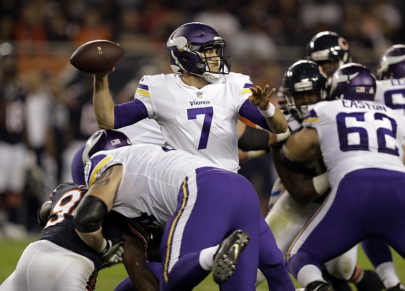 Minnesota Vikings quarterback Case Keenum (7) throws a pass during the first half of an NFL football game against the Chicago Bears, Monday, Oct. 9, 2017, in Chicago. (AP Photo/Darron Cummings)