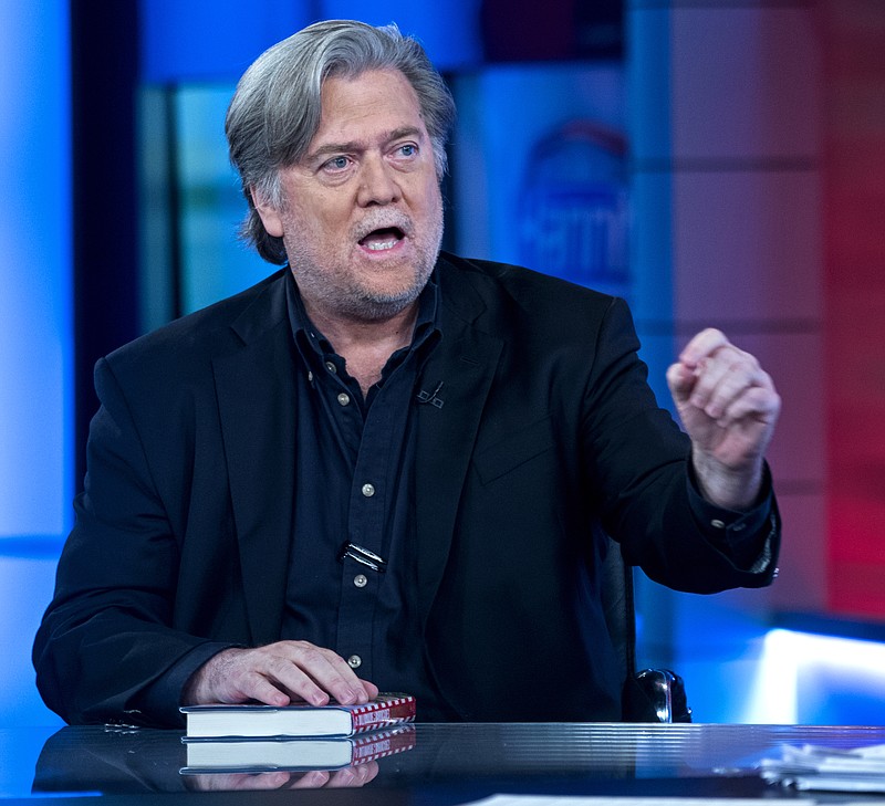 Former White House strategist Steve Bannon takes part in an interview with host Sean Hannity, on the set of Fox News Channel's Hannity, in New York Monday, Oct 9, 2017. (AP Photo/Craig Ruttle)