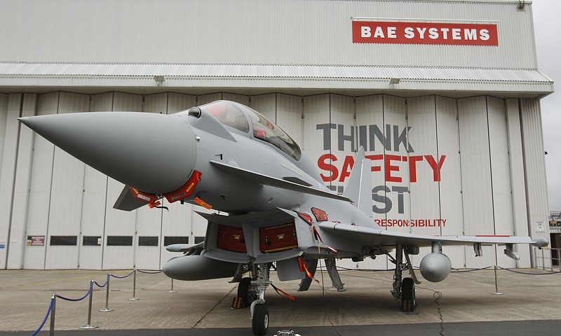 
              FILE - This is a  Sept. 7, 2012 file photo of a Eurofighter Typhoon at BAE Systems, Warton Aerodrome, near Warton northwest England. British defense company BAE Systems is cutting almost 2,000 jobs in its military, maritime and intelligence services in an effort to boost competitiveness. CEO Charles Woodburn said in a statement Tuesday Oct. 10, 2017, that the actions are necessary to "align our workforce capacity more closely with near-term demand and enhance our competitive position to secure new business." (Peter Byrne/PA, File via AP)
            