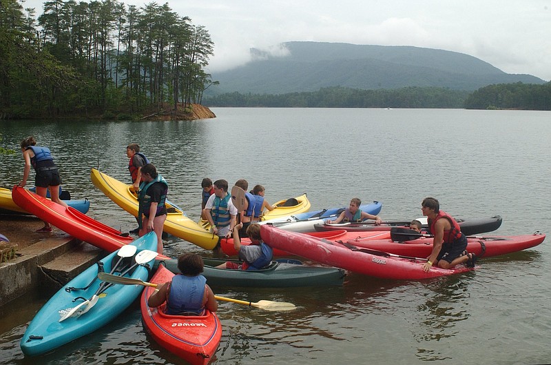 Campers finish a day of kayaking at Camp Ocoee in this file photo. Proceeds from a land deal between the U.S. Forest Service and the YMCA benefits the camp. 