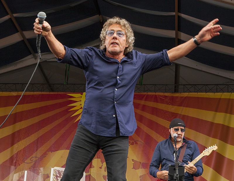 
              FILE - In this April 25, 2015 file photo, Roger Daltrey and Pete Townshend perform with The Who at the New Orleans Jazz & Heritage Festival, in New Orleans. Daltrey has a book deal with Blink Publishing in the UK and Henry Holt and Company in the United States. The memoir, announced Wednesday, Oct. 11, 2017, is currently untitled and scheduled to come out next August. (Photo by Barry Brecheisen/Invision/AP, File)
            