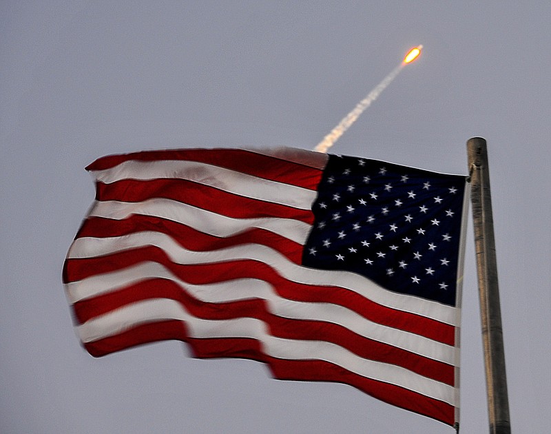 
              A SpaceX Falcon is launched at Kennedy Space Center, Wednesday, Oct. 11, 2017, in Cape Canaveral, Fla. The unmanned Falcon, recycled following a February flight, blasted off with a satellite. Minutes later, the leftover booster landed on an offshore barge. The dual-mission satellite will be shared by Colorado-based EchoStar and SES, a Luxembourg company. (Malcolm Denemark/Florida Today via AP)
            