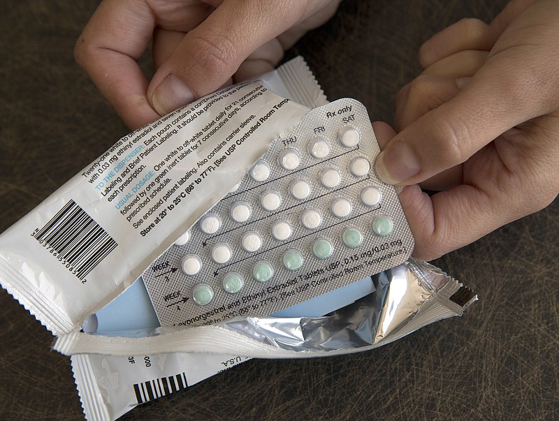 
              FILE - In this Aug. 26, 2016, file photo, a one-month dosage of hormonal birth control pills is displayed in Sacramento, Calif.  The Trump administration’s new birth control rule is raising questions among some doctors and researchers. They say it overlooks known benefits of contraception while selectively citing data that raise doubts about effectiveness and safety. Recently issued rules allow more employers to opt out of covering birth control as a preventive benefit for women under former President Barack Obama’s health care law.(AP Photo/Rich Pedroncelli, File)
            