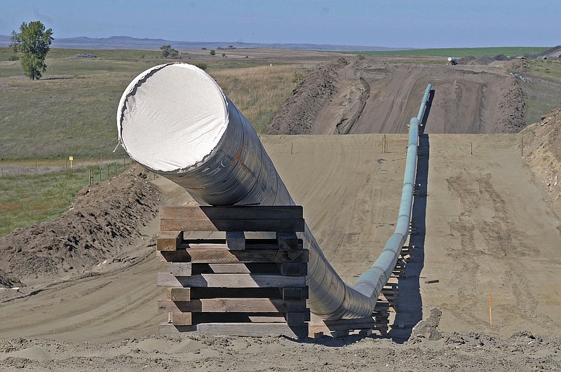 
              FILE - This Sept. 29, 2016, file photo, shows a section of the Dakota Access pipeline under construction near St. Anthony in Morton County, N.D. A federal judge ruled Wednesday, Oct. 11, 2017, that the Dakota Access oil pipeline can continue operating while a study is completed to assess its environmental impact on the Standing Rock Sioux. (Tom Stromme/The Bismarck Tribune via AP, file)
            