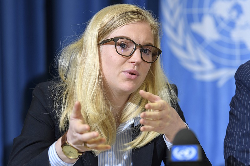 
              Karin Friedrich speaks during a press conference on Myanmar at the European headquarters of the United Nations in Geneva, Switzerland, Wednesday, Oct. 11, 2017. Friedrich, who was part of the U.N. mission to Bangladesh, told a press conference “Rohingya men aged 15 to 40 were reportedly arrested by the Myanmar police” and detained without any charges, she said. A report by the U.N. human rights office says attacks against Rohingya Muslims in Myanmar point to a strategy to instill “widespread fear and trauma” and prevent them ever returning to their homes. (Martial Trezzini/Keystone via AP)
            