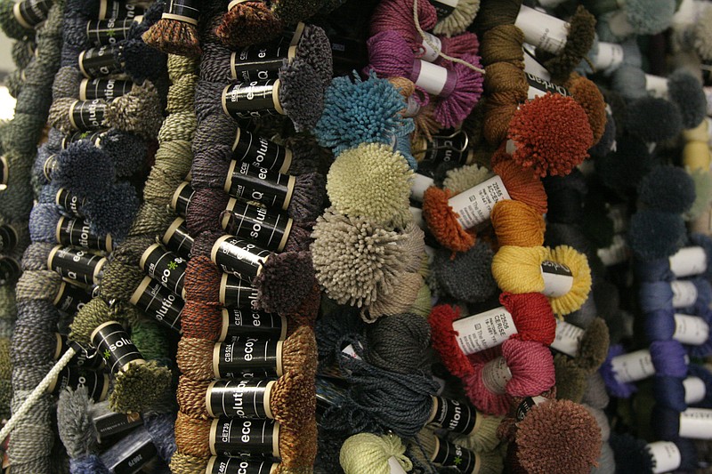 These threads are used to match true colors of thread used in carpet to the colors used on the paper samples made by Tricycle.  One of Chattanooga's greener businesses, Tricycle produces carpet samples on paper, which is better for budgets and the environment.  The company's printouts are recyclable and do not consume any oil in their production, unlike the carpet squares previously used by interior decorators.  