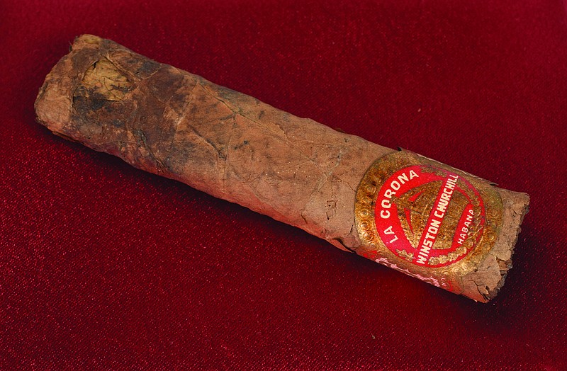 
              This recent photograph provided by RR Auction shows a cigar once smoked by British Prime Minister Winston Churchill. Churchill's half-smoked cigar, which was from a 1947 trip to Paris, sold for just over $12,000 during an online auction. Boston-based RR Auction says the 4-inch (10-centimeter) cigar was bought Wednesday evening, Oct. 11, 2017, by a collector from Palm Beach, Florida. The buyer's name wasn't released. (RR Auction photo via AP)
            
