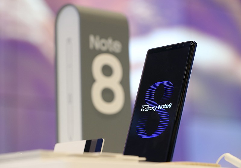 
              In this Thursday, Oct. 12, 2017 photo, Samsung Electronics' Galaxy Note 8 is displayed in Seoul, South Korea. Samsung Electronics says Friday, Oct. 13, 2017, its third quarter profit likely surged nearly three folds over a year earlier to a new record high. (AP Photo/Lee Jin-man)
            