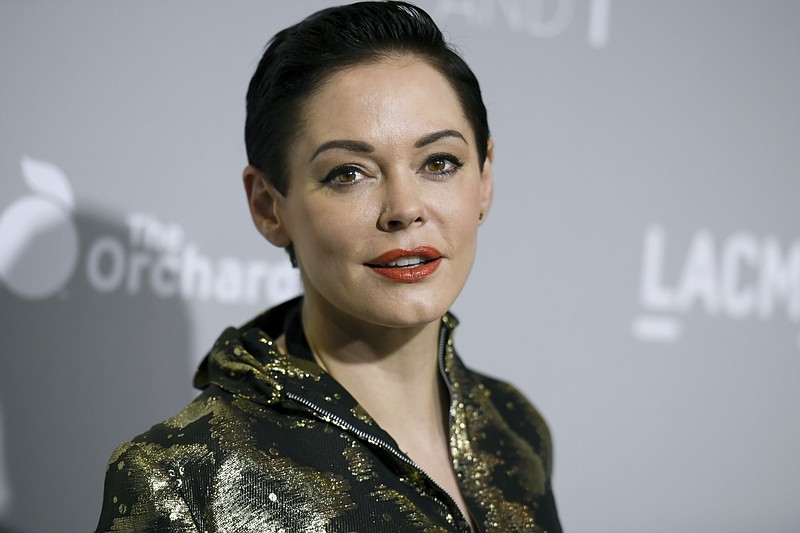 
              FILE - In this April 15, 2015 file photo, Rose McGowan arrives at the LA Premiere Of "DIOR & I" held at the Leo S. Bing Theatre on Wednesday, April 15, 2015, in Los Angeles.  McGowan’s Twitter account has been suspended, temporarily muting a central figure in the allegations against Harvey Weinstein. McGowan said late Wednesday, Oct. 11, 2017,  that Twitter had suspended her from tweeting after the social media company said she broke its rules.(Photo by Richard Shotwell/Invision/AP)
            
