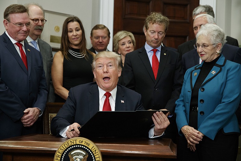 
              President Donald Trump speaks before signing an executive order on health care in the Roosevelt Room of the White House, Thursday, Oct. 12, 2017, in Washington. (AP Photo/Evan Vucci)
            