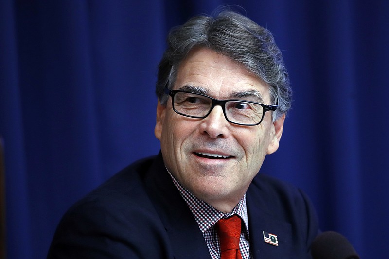 
              FILE - In this July 18, 2017, file photo, Energy Secretary Rick Perry attends a news conference at the National Press Club in Washington. The Energy Department says Perry has taken at least six trips on government or private planes costing an estimated $56,000. (AP Photo/Jacquelyn Martin, File)
            