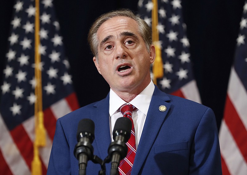 
              In this Aug. 16, 2017 photo, Veterans Affairs Secretary David Shulkin speaks during a press briefing in Bridgewater, N.J. The Department of Veterans Affairs has abruptly dropped plans to suspend an ethics law barring employees from receiving benefits from for-profit colleges. The move comes after criticism from government watchdogs, who warned of financial entanglements between government and the private companies vying for millions in GI Bill tuition. In a statement to The Associated Press, the VA said it had received "constructive comments" and as a result would delay action.   (AP Photo/Pablo Martinez Monsivais)
            