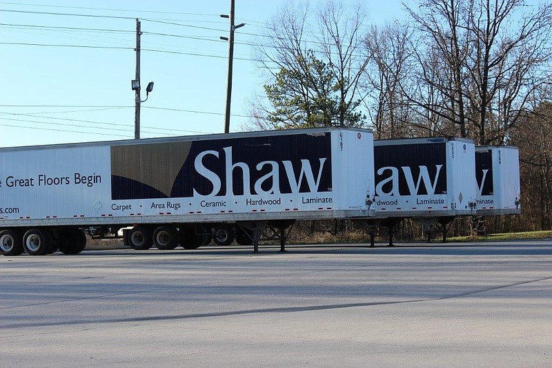 Shaw Industries trucks are shown in this file photo.