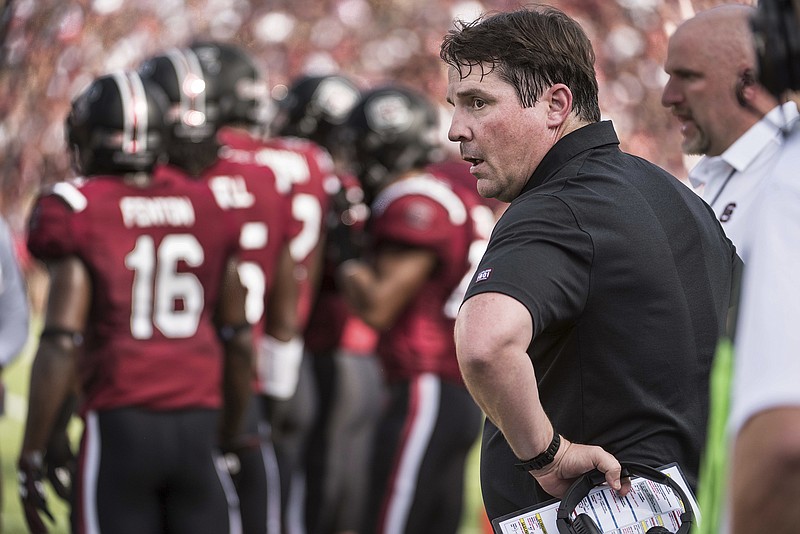 South Carolina football coach Will Muschamp was fired during his fourth season at Florida as fans became increasingly noticeable with their frustration in the direction the program was headed. Muschamp's Gamecocks play today at Tennessee, where coach Butch Jones is under pressure after a disappointing start to his fifth season.