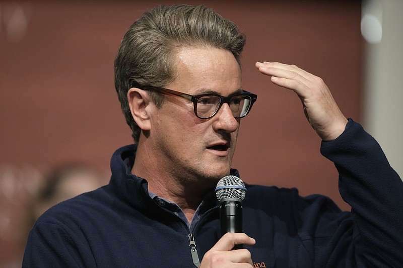 
              FILE - In this Oct. 11, 2017, file photo, MSNBC television anchor Joe Scarborough takes questions from an audience at forum at the John F. Kennedy School of Government, on the campus of Harvard University, in Cambridge, Mass. Scarborough announced Oct. 12, 2017, that he formally left the Republican party and became an independent. (AP Photo/Steven Senne, File)
            