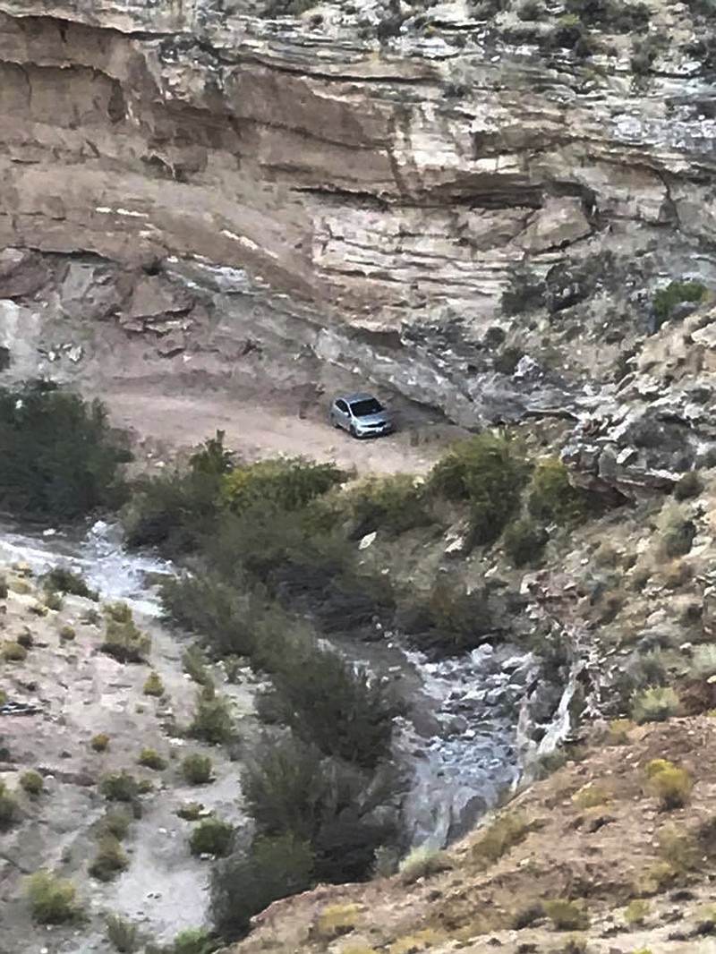 
              In this Oct. 2, 2017, photo released by Kane County Search and Rescue shows a vehicle driven by an older Texas couple, who were rescued severely dehydrated but alive after they were stranded six days on a desolate dirt road in southern Utah that was impassable in their rental car in the Grand Staircase-Escalante National Monument in southern Utah. The couple ended up on the rocky road Sept. 26 while following directions from a GPS-mapping app on their way to see Lake Powell. (Kane County Search and Rescue via AP)
            