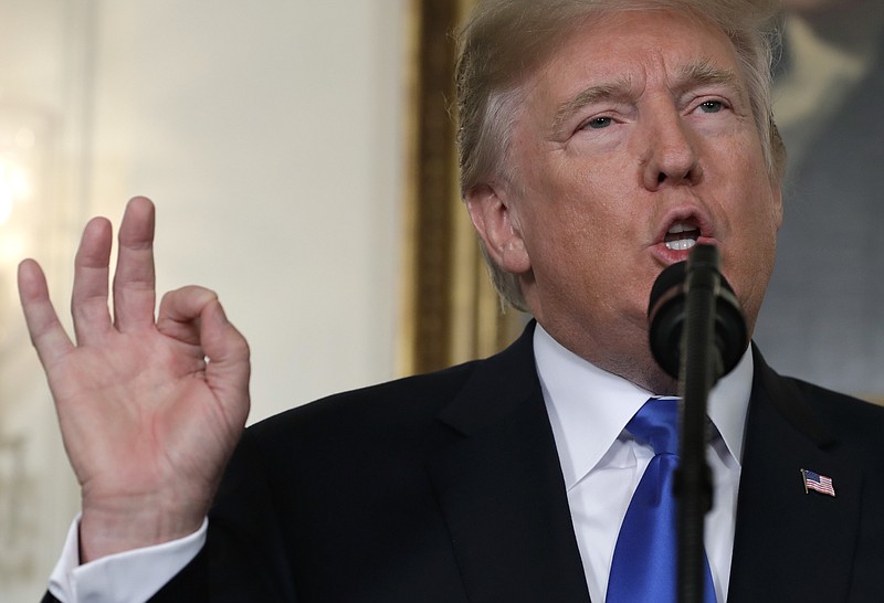 President Donald Trump speaks on Iran policy from the Diplomatic Reception Room of the White House, Friday, Oct. 13, 2017, in Washington. (AP Photo/Evan Vucci)

