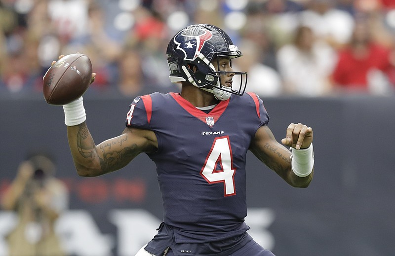 
              Houston Texans quarterback Deshaun Watson (4) throws a pass in the first half of an NFL football game against the Cleveland Browns on Sunday, Oct. 15, 2017, in Houston. (AP Photo/Eric Gay)
            