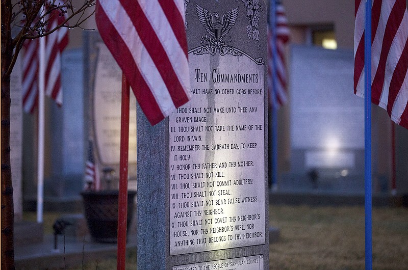 
              The Bloomfield Ten Commandments memorial is pictured, Monday, Feb. 13, 2017 at Bloomfield City Hall in Bloomfoeld,, N.M The U.S. Supreme Court on Monday, Oct. 16, 2017, sided with a lower court, the the 10th U.S. Circuit Court of Appeals, that ordered Bloomfield to remove a Ten Commandments monument from the lawn outside City Hall. (Jon Austria/The Daily Times via AP)
            