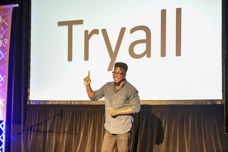 Jason Oteng-Nyame holds first place with his Tryall pitch in the Will This Float competition for startup companies Monday night.