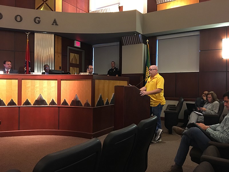 Jared Story, administrative assistant for UTC Housing and Residence Life, asks the Chattanooga City Council to oppose the adoption of a statewide outsourcing agreement for facility workers at the university.