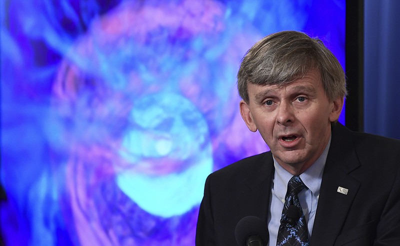 
              David Reitze of the California Institute of Technology and the executive director of the Laser Interferometer Gravitational-Wave Observatory, or LIGO, speaks at the National Press Club in Washington, Monday, Oct. 16, 2017, during an announcement on one of the most violent events in the cosmos that was witnessed completely for the first time in August and tells scientists where gold and other heavy elements come from. (AP Photo/Susan Walsh)
            