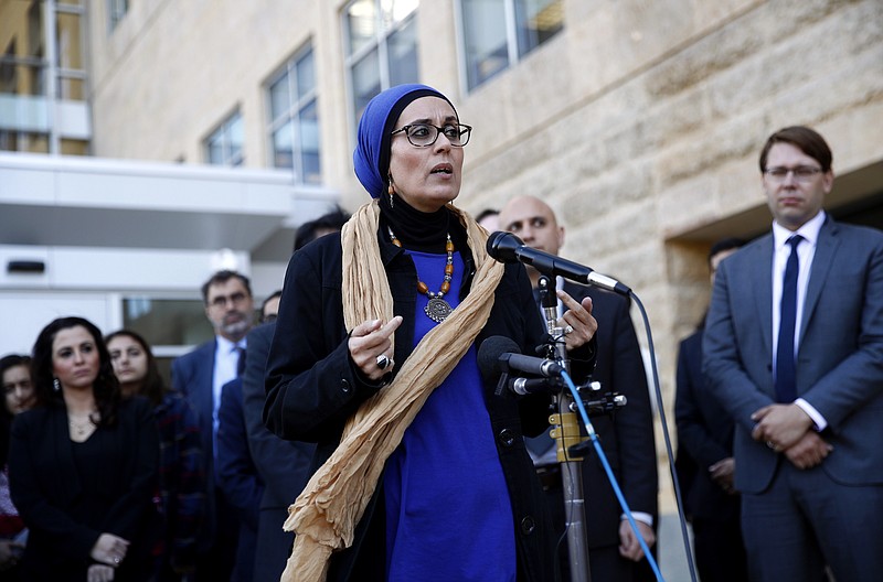 
              Debbie Almontaser, a board member of the Yemeni American Merchants Association, speaks at a news conference outside a federal courthouse in Greenbelt, Md., Monday, Oct. 16, 2017, following a hearing regarding three lawsuits over the Trump administration's restrictions on travelers from certain countries. The lawsuits' plaintiffs want the judge to block the latest restrictions from going into effect Wednesday. (AP Photo/Patrick Semansky)
            