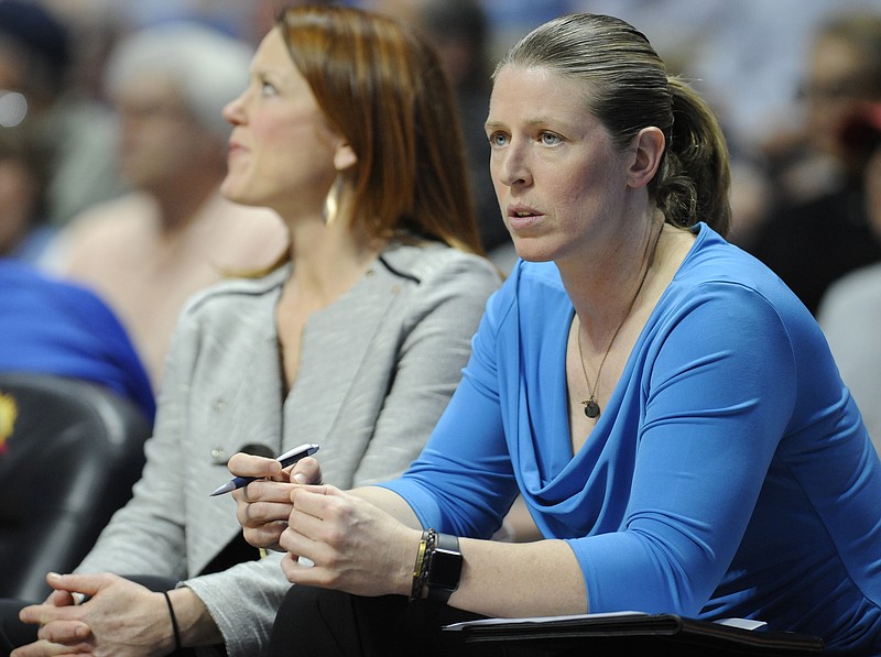 
              FILE - In this June 16, 2016, file photo, New York Liberty associate head coach Katie Smith watches from the bench during the first half of a WNBA basketball game in Uncasville, Conn. Katie Smith is the new coach of the New York Liberty. Smith has been an assistant with the Liberty since she retired from the WNBA in 2013. She was promoted to associate head coach in 2016. The team announced Monday, Oct. 16, 2017,  that she is taking over for Bill Laimbeer, who served as the Liberty’s coach from 2013-17. (AP Photo/Jessica Hill, File)
            