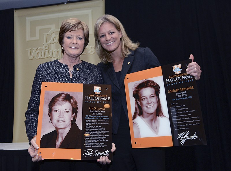 This Nov. 2, 2012, photo provided by the University of Tennessee Athletics Department, shows Pat Summitt, left, and Michelle Marciniak at Lady Vol Hall of Fame induction ceremonies in Knoxville, Tenn. Michelle Brooke-Marciniak played for Pat Summitt on Tennessee's 1996 national championship team and now serves as a board member on her former coach's foundation. Brooke-Marciniak will honor Summitt once again this week as she joins a group of cyclists riding 1,098 miles - one mile for each of Summitt's career wins - to raise money and awareness in fighting Alzheimer's disease. (Wade Rackley/University of Tennessee Athletic Department via AP)


