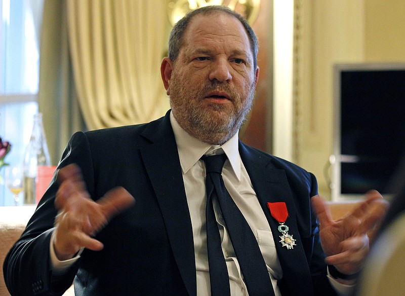 
              FILE - In this March 7, 2012 file photo, U.S film producer and movie studio chairman Harvey Weinstein during an interview with the Associated Press in Paris, the same day as Weinstein received, Chevalier of the Legion of Honor by French President Nicolas Sarkozy. French President Emmanuel Macron says Sunday Oct. 15, 2017 that he wants to revoke Harvey Weinstein's Legion of Honor award after the wave of accusations of sexual harassment and abuse against the Hollywood titan. (AP Photo/Remy de la Mauviniere, File)
            