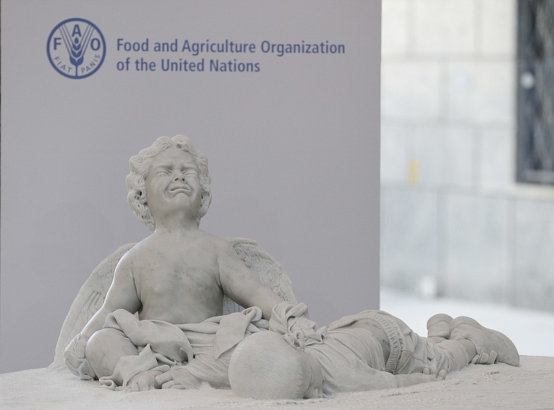 
              This photo shows a marble statue representing the tragedy of migration donated by Pope Francis during his visit to the United Nations Food and Agriculture Organization (FAO) on the occasion of the World Food Day, Monday, Oct. 16, 2017. The statue commemorates Aylan Kurdi, the 3-year old refugee boy drowned on Sept. 2015 while crossing the Mediterranean Sea. (AP PhotoAndrew Medichini)
            