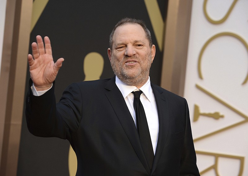 
              FILE - In this March 2, 2014 file photo, Harvey Weinstein arrives at the Oscars in Los Angeles. In the wake of sexual harassment and abuse allegations against Weinstein, many in Hollywood are calling for sweeping changes to the entertainment industry to prevent the mistreatment of women. Among some of the changes experts recommend are an independent agency to investigate harassment complaints and preventing sexual harassment allegations from being hidden behind non-disclosure agreements. (Photo by Jordan Strauss/Invision/AP, File)
            