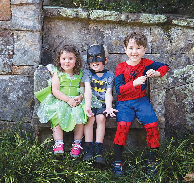 Locals Gwen Atherton, Henry Houston and Barrett Atherton, from left, are ready for the Halloween costume parade set to wind through Old Town and end up at the MACC. (Contributed photo)