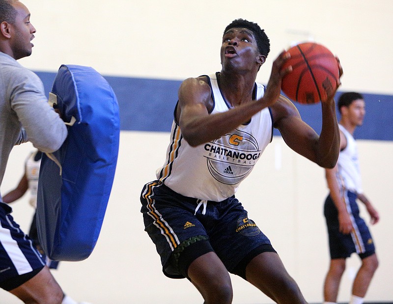 University of Tennessee at Chattanooga basketball player James Lewis Jr. (10) works on drills during practice at Chattem Gym at UTC on Monday, October 9, 2017, in Chattanooga, Tenn.
