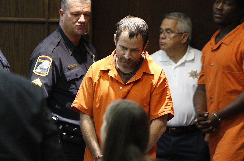 Benjamin Brewer, the truck driver who failed to stop his tractor-trailer on Interstate 75 and caused a wreck that killed six people on June 25, appears before Judge Don Poole for arraignment while at the Hamilton County Criminal Court's building in Chattanooga, Tenn., on September 11, 2015. 